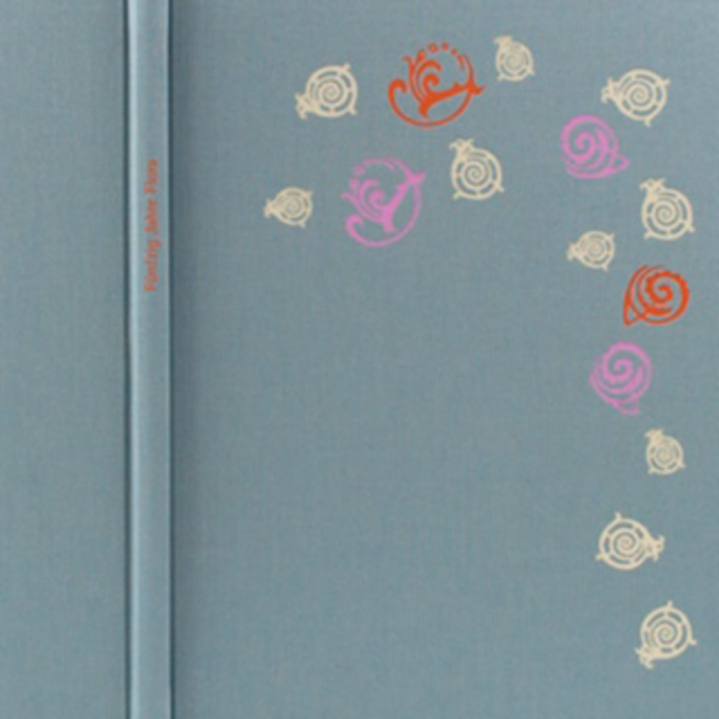 Eine blaue Buch Frontseite mit blumenartigen Symbolen.