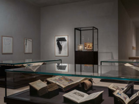 Photo of an exhibition in which manuscripts from the 13th - 15th centuries are on display.
