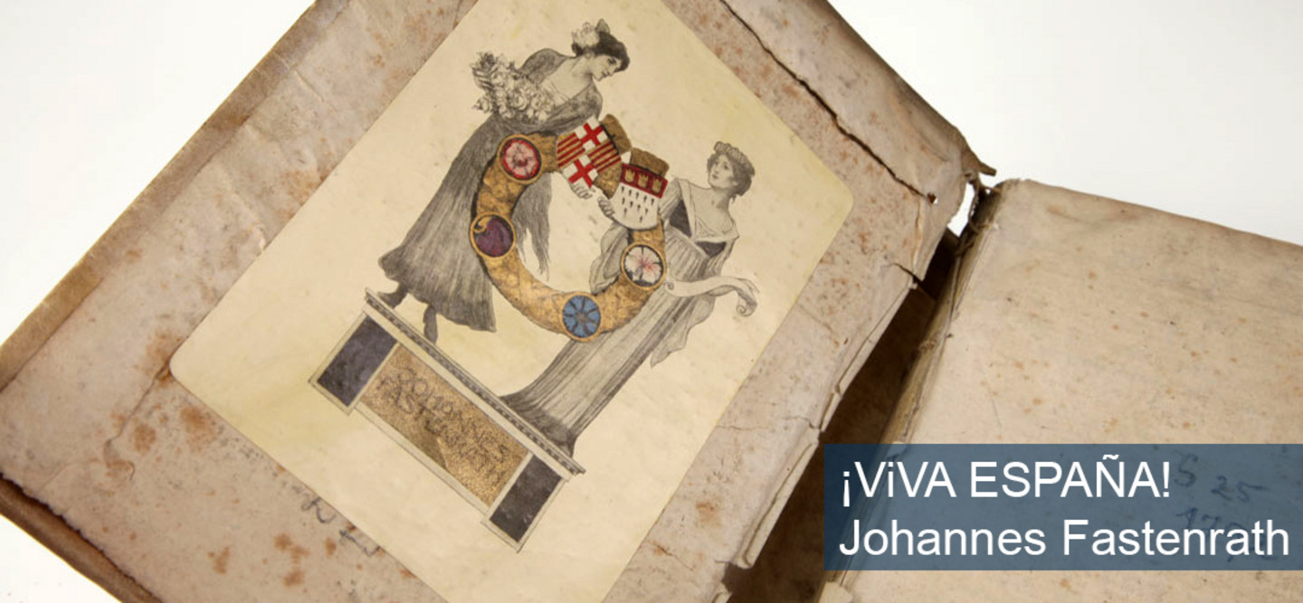 Foto von einem aufgeklappten Umschlag mit zwei Frauen drauf, die auf einem Podest stehen und einen Kranz halten. Zusaätzlich hat das Foto die Aufschrift "Viva Espana" von Johannes Fastenrath.